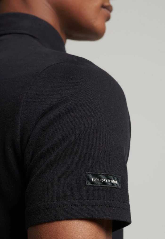 Superdry STUDIOS - Polo Shirt - Black 3 Superdry STUDIOS - Polo Shirt - Black - Image 3