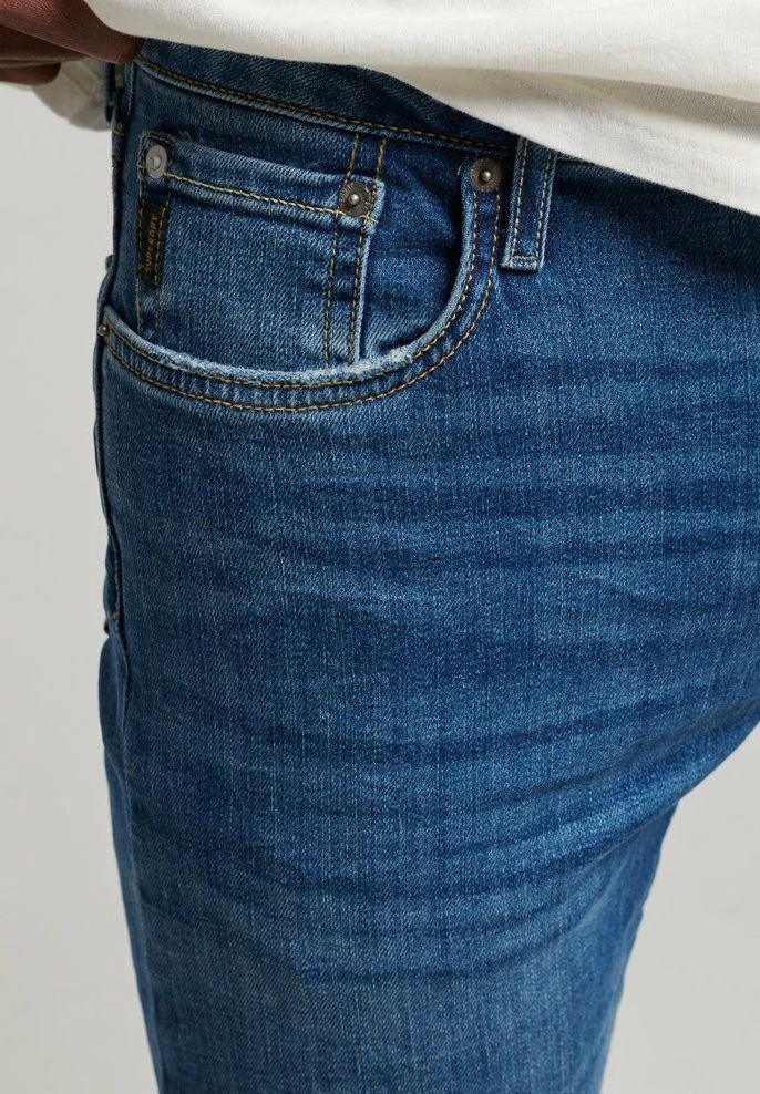 Superdry Slim Fit Jeans - Stanton Bright Blue Rip 5 Superdry Slim Fit Jeans - Stanton Bright Blue Rip - Image 5