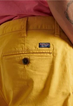 Superdry INTERNATIONAL - Shorts - Yolk Yellow -Superdry Shop 1ecdf419902c49648f6fda71945b7e47
