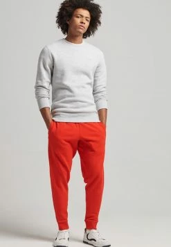 Superdry ESSENTIAL TAPERED CUFF - Tracksuit Bottoms - Bright Red