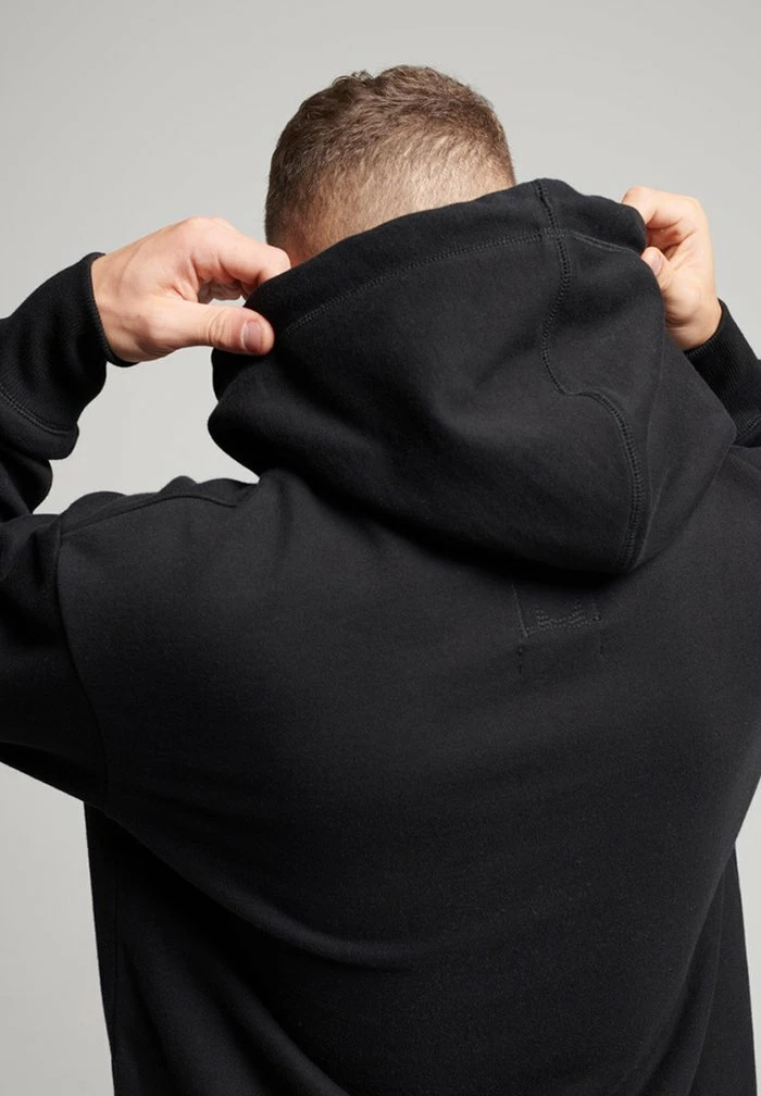 Superdry CHICO LEONG - Hoodie - Black 1 Superdry CHICO LEONG - Hoodie - Black