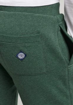 Superdry COLLEGIATE - Tracksuit Bottoms - Enamel Green Marl -Superdry Shop 3664bd6d47ba441ca224c352aec818ee