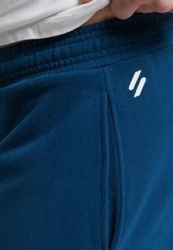 Superdry CODE CORE - Tracksuit Bottoms - Pilot Mid Blue -Superdry Shop 4c7fc64c49de473ebd5533f59b9680ee