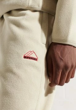 Superdry MOUNTAIN SPORT - Tracksuit Bottoms - Pelican -Superdry Shop 5e20705f801c4f119ff7de7f630226dd