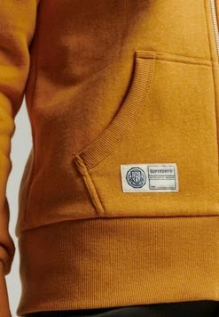 Superdry VINTAGE SCRIPT STYLE COLL - Zip-up Sweatshirt - Thrift Gold Mark -Superdry Shop 6cd9a139fcfa46c1b0ec2bc8f3596c70