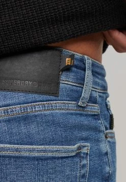 Superdry Jeans Skinny Fit - Stanton Bright Blue Rip -Superdry Shop 8815c448ff104f9c88bc4f449919e71b