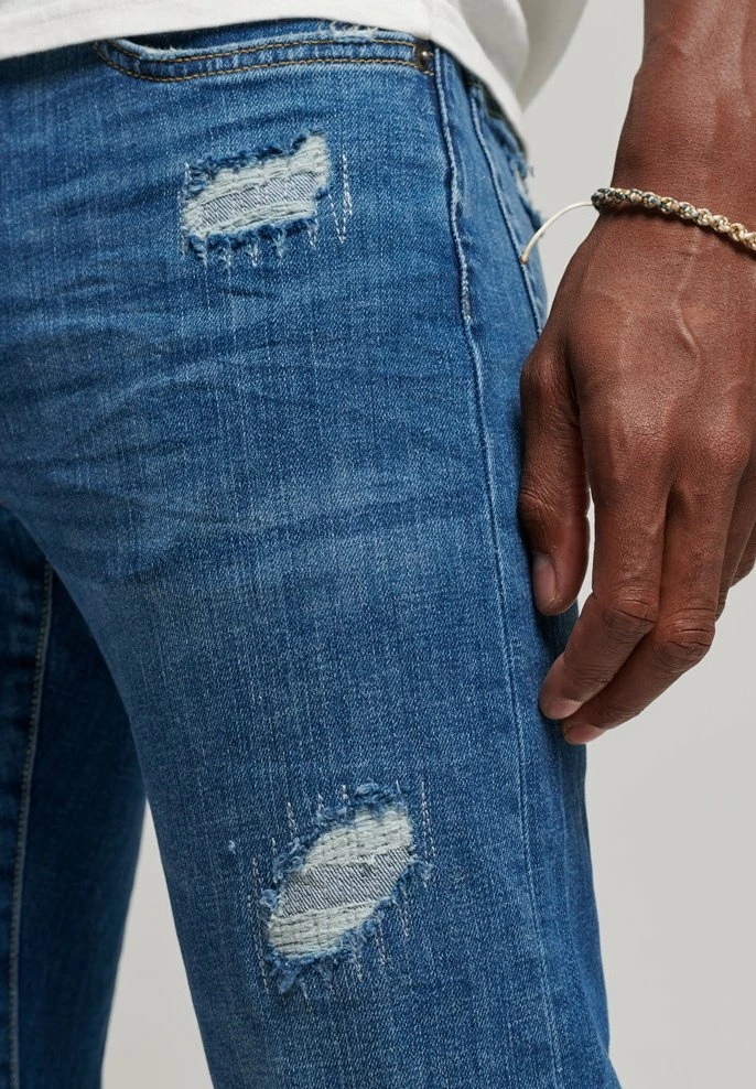 Superdry Slim Fit Jeans - Stanton Bright Blue Rip 4 Superdry Slim Fit Jeans - Stanton Bright Blue Rip - Image 4