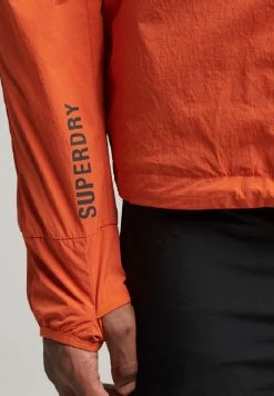 Superdry Waterproof Jacket - Burnt Ochre -Superdry Shop a4ef25e46b7749c08b9d2d257dcb68ee