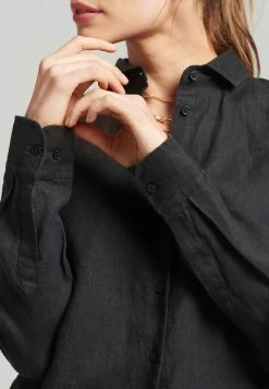 Superdry STUDIOS LONG SLEEVE - Button-down Blouse - Black -Superdry Shop a8452d5e767840c48096a881b3ea3d72