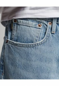 Superdry Jeans Tapered Fit - Beak Beat Up Blue -Superdry Shop b2b52c6274c14448abd0718260b0b48f